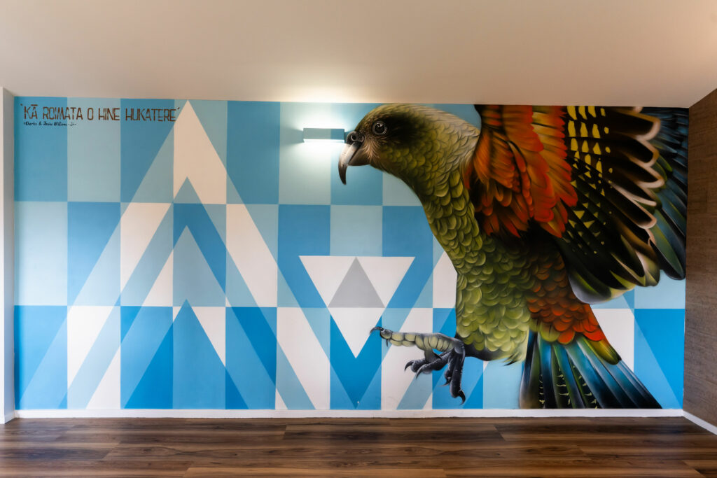 Haka House Franz Josef mural painting | New Zealand artists Charles and Janine Williams